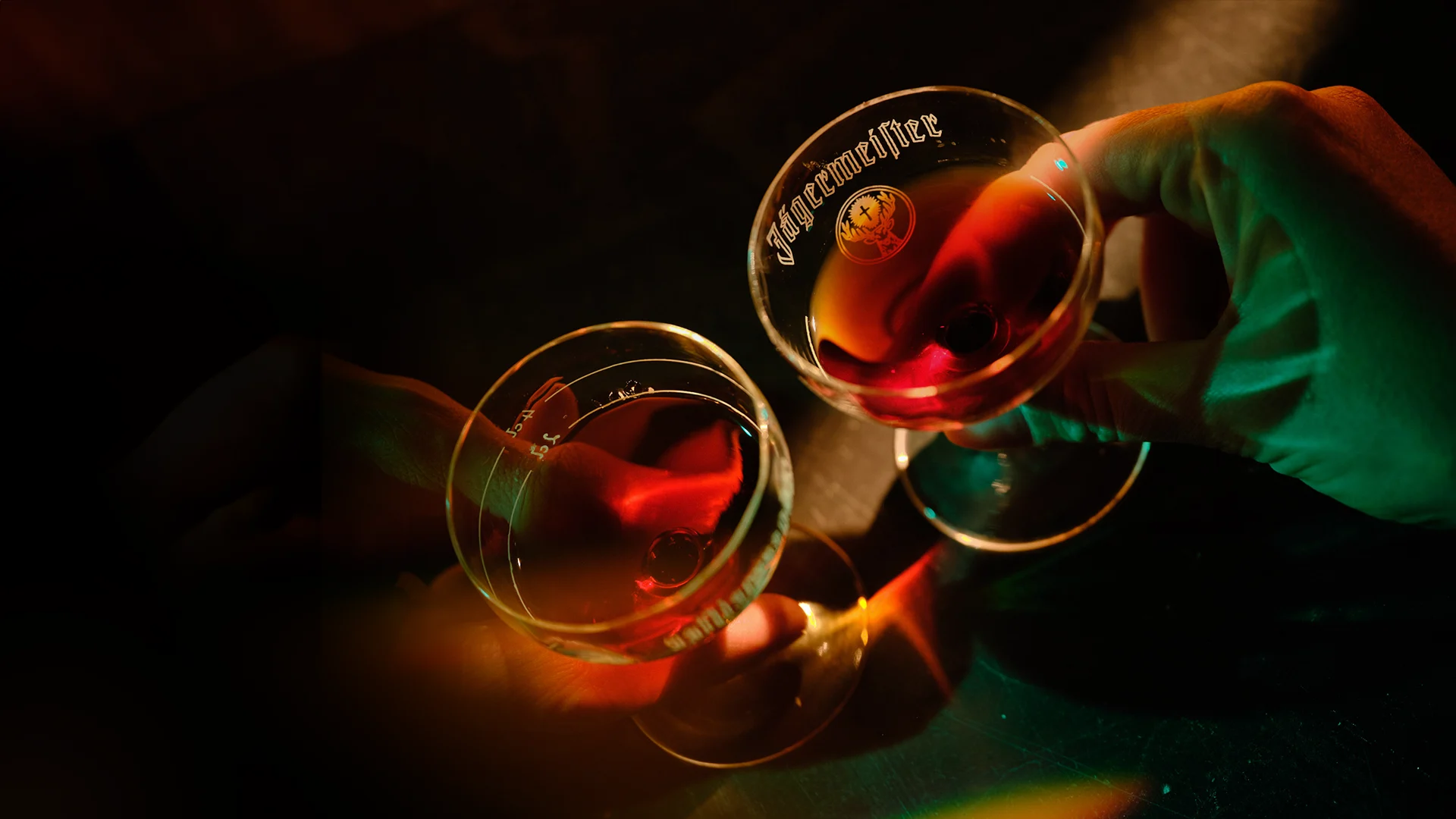 A neon sign displaying the Jägermeister logo