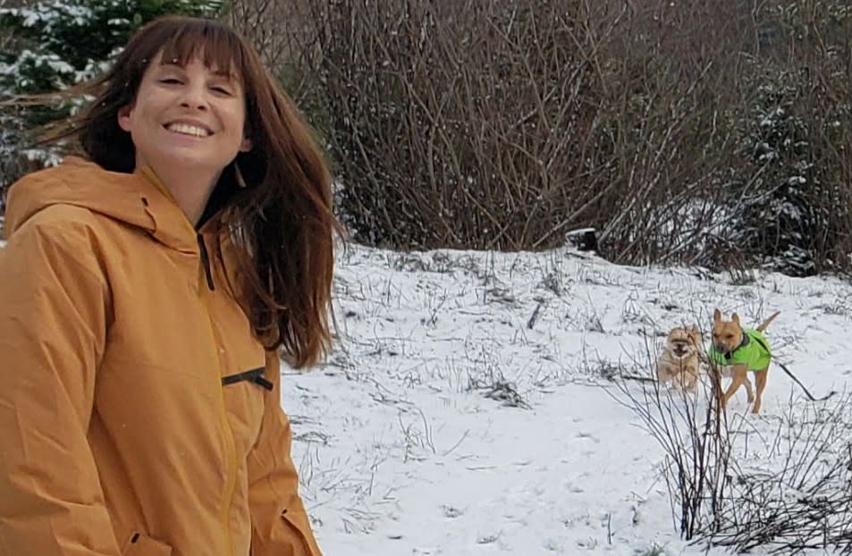Deanna on a snowy walk with her dogs