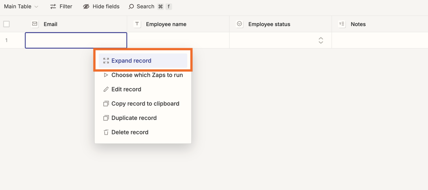 Screenshot of expand record button in tables