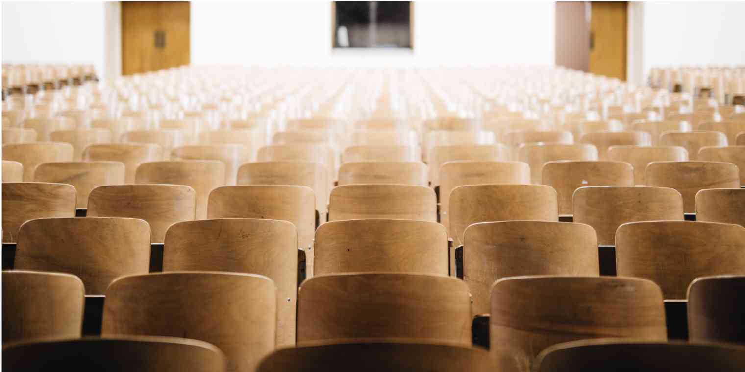 Hero image of an empty lecture hall