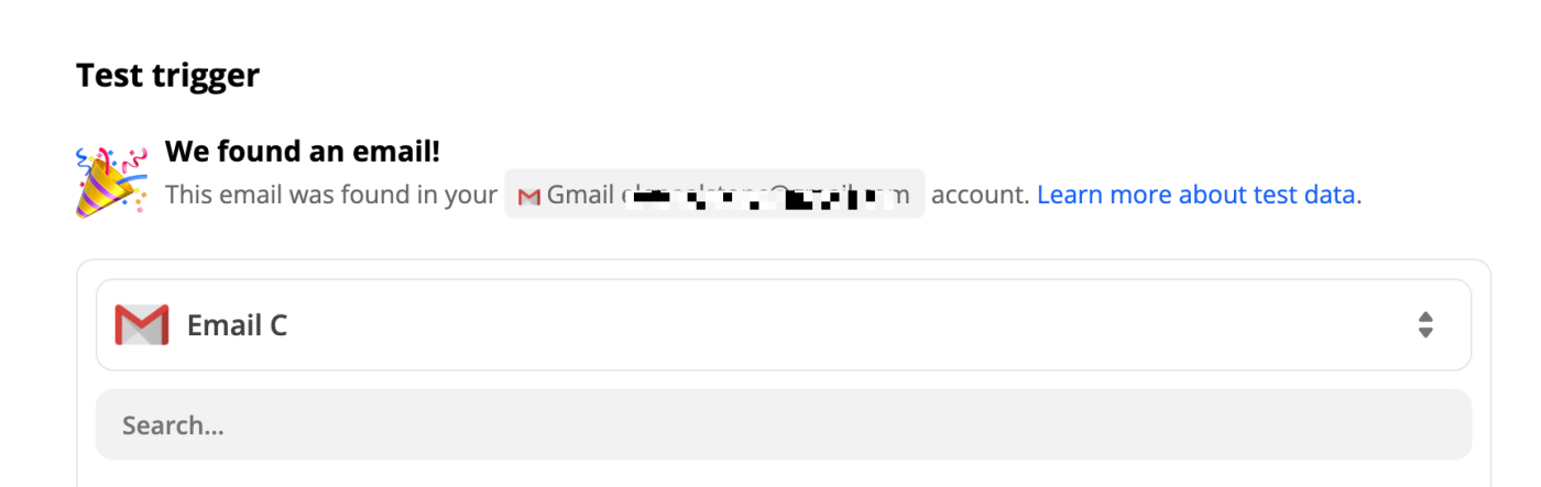 A confetti emoji next to the text "We found an email!" on a success page. 