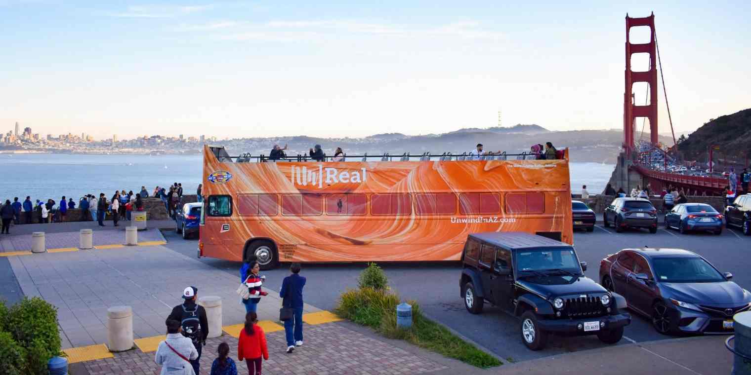 Hero image with a large ad on a bus in San Fracisco