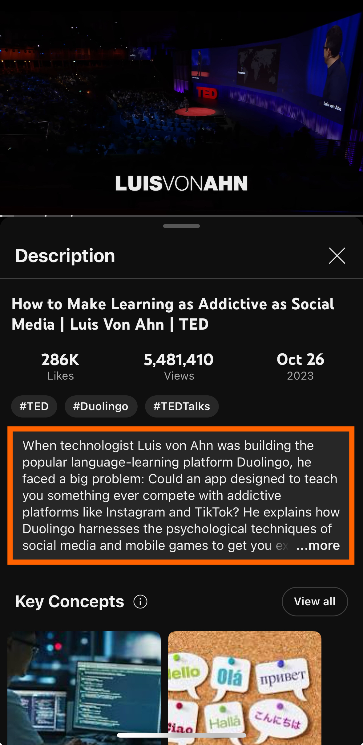 Screenshot showing the description box under the YouTube video with an orange box around it on mobile