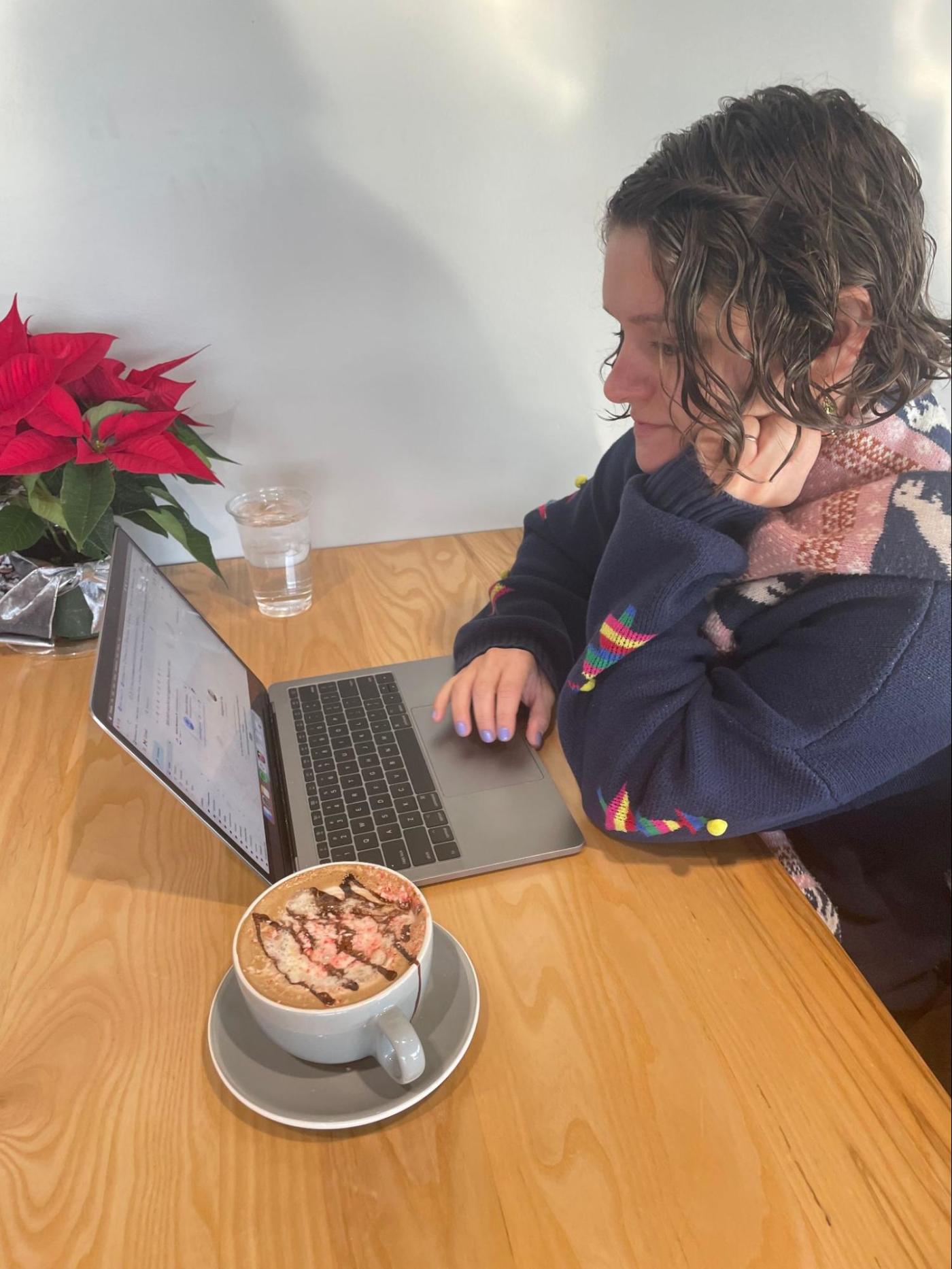 Amanda working from a coffee shop