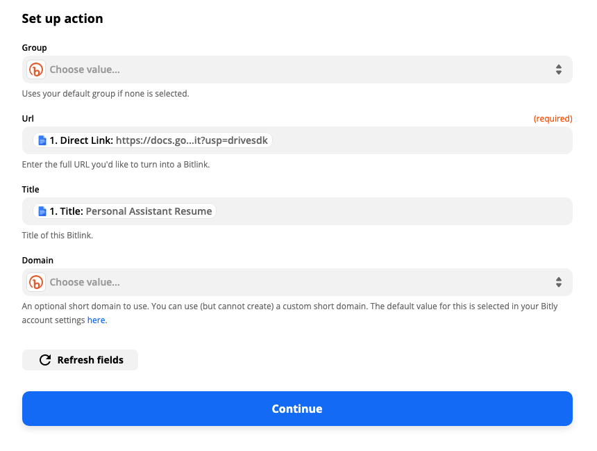 The action step in the Zap editor. The Google Docs direct link and document title input fields are pre-selected to be used as the URL for Bitly to shorten and the Bitlink title. 