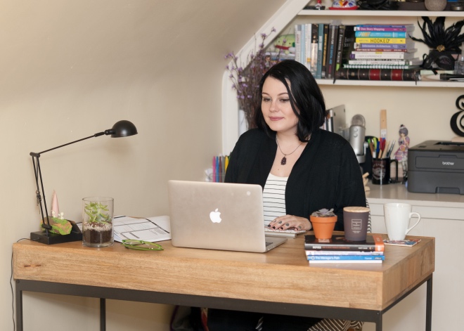 Lindsey Redinger of InVision working at her desk