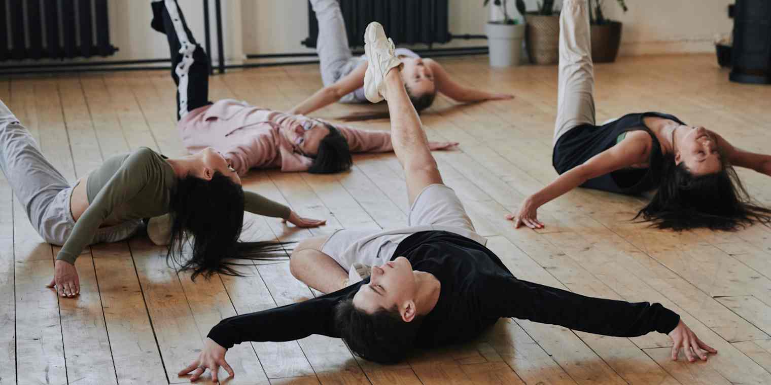Hero image of people in a studio dancing