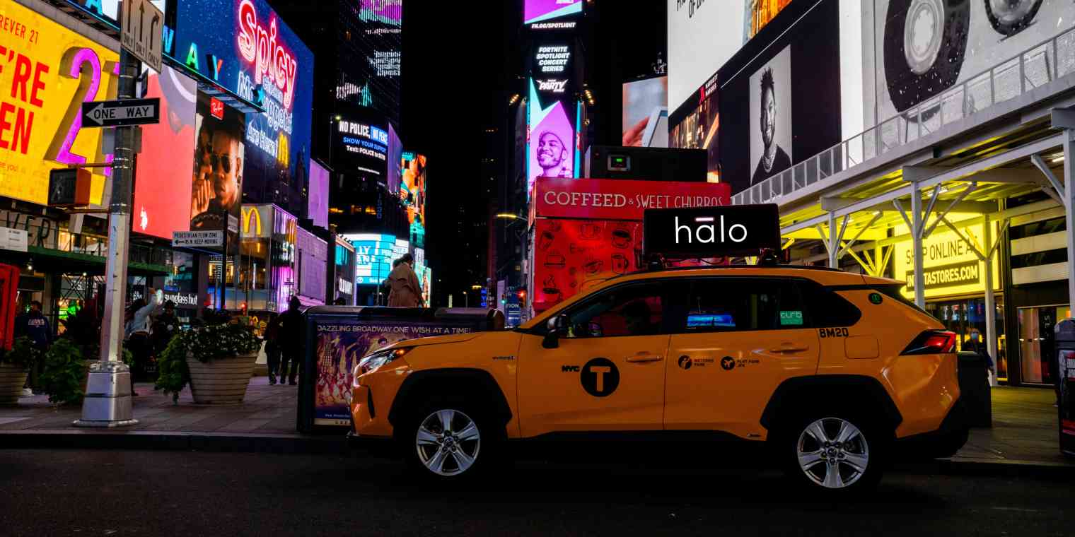 A vehicle with a Halo advertising unit on the top.