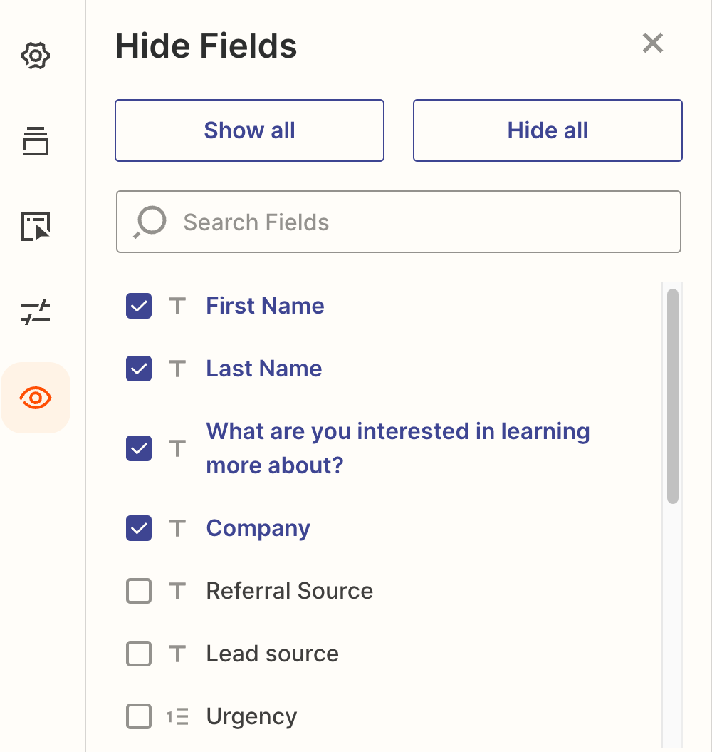 Deselect the fields you'd like to hide from a view.