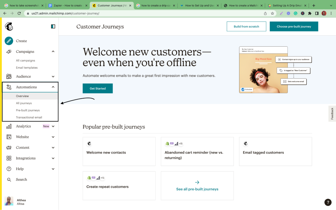 An arrow pointing to the Overview section on the Mailchimp sidebar