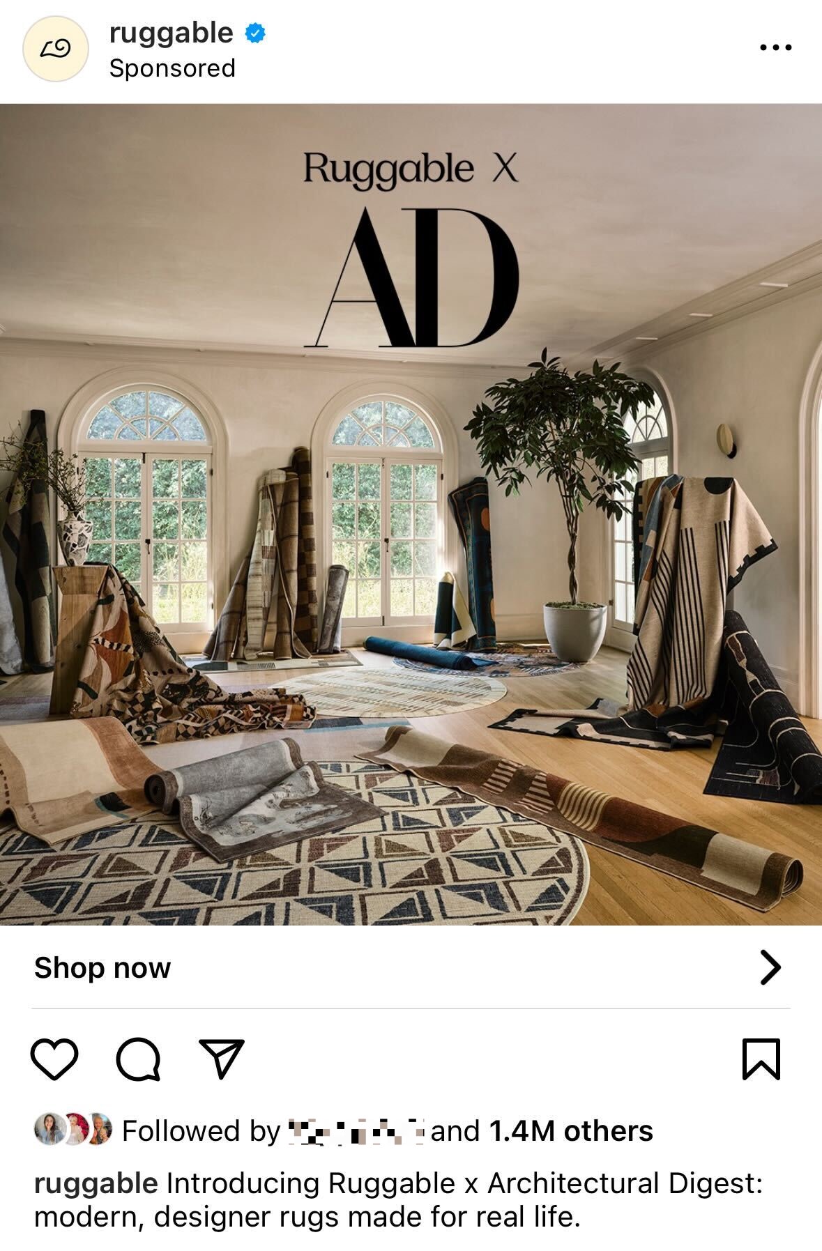 A social media advertising example: A picture of Ruggable rugs introducing the collab with Architectural Digest