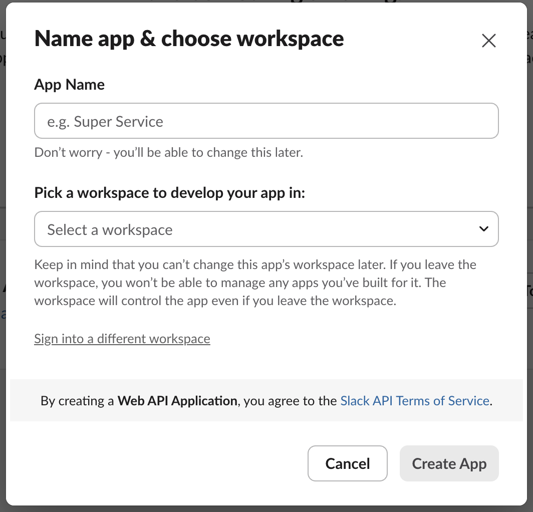 Slack dialog box to name an app and select a workspace with Create App and Cancel buttons