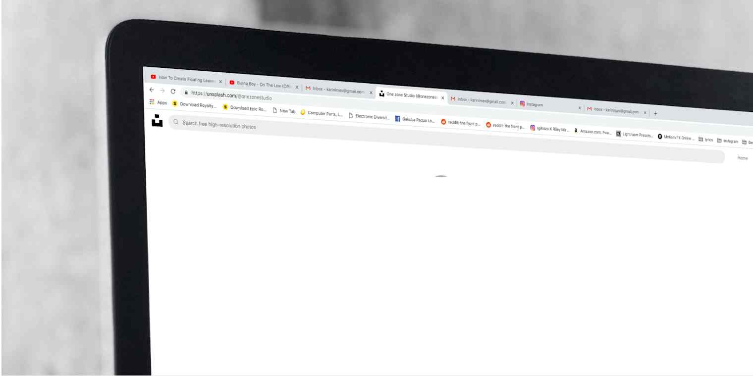 Portion of a monitor with multiple tabs open in a web browser.