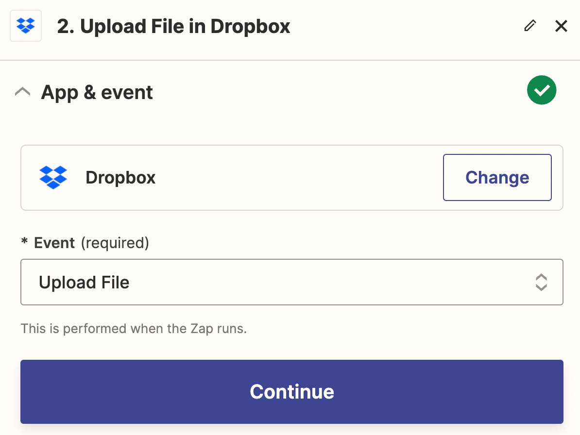 An action step in the Zap editor with Dropbox selected for the action app and Upload File selected for the action event.