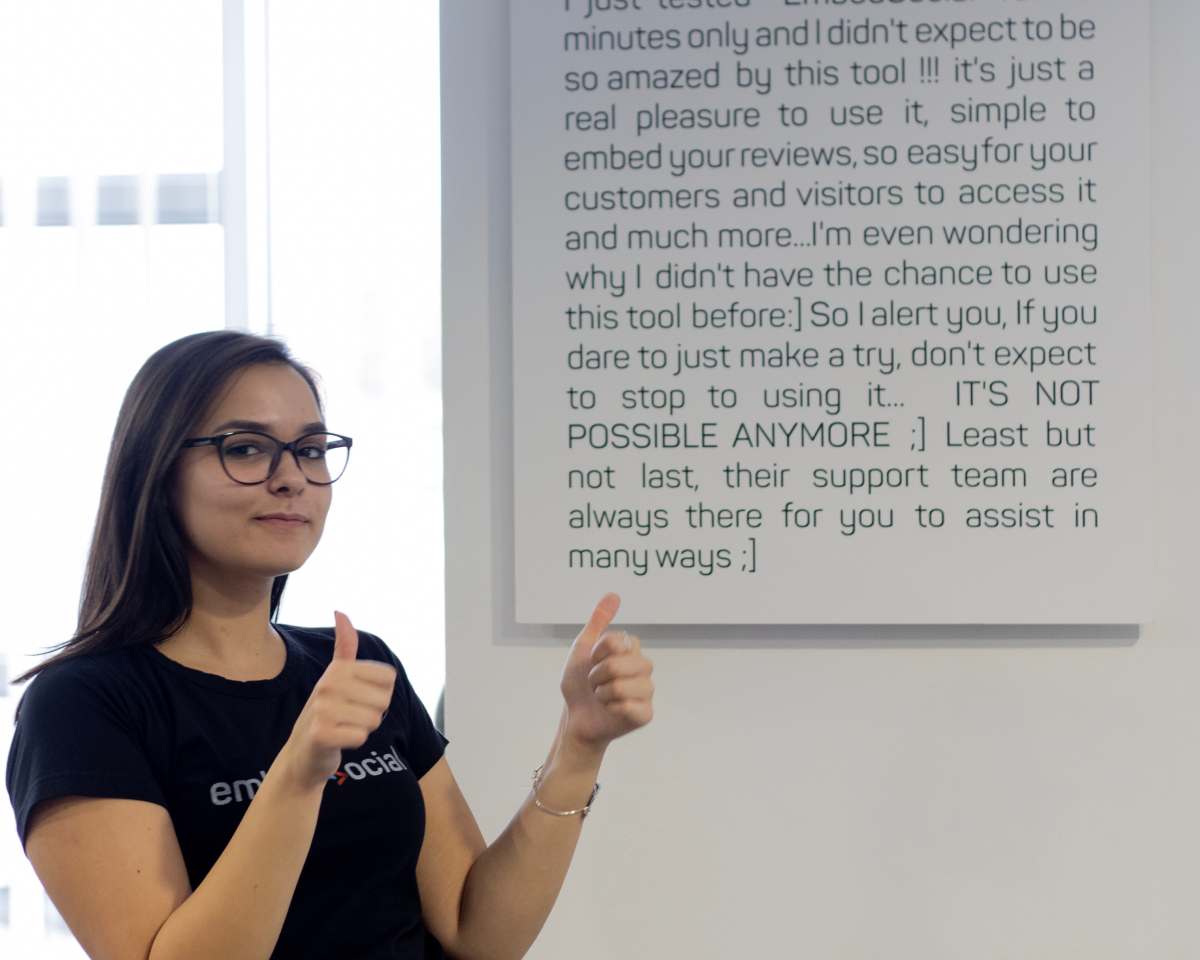 A poster of a testimonial in EmbedSocial's office