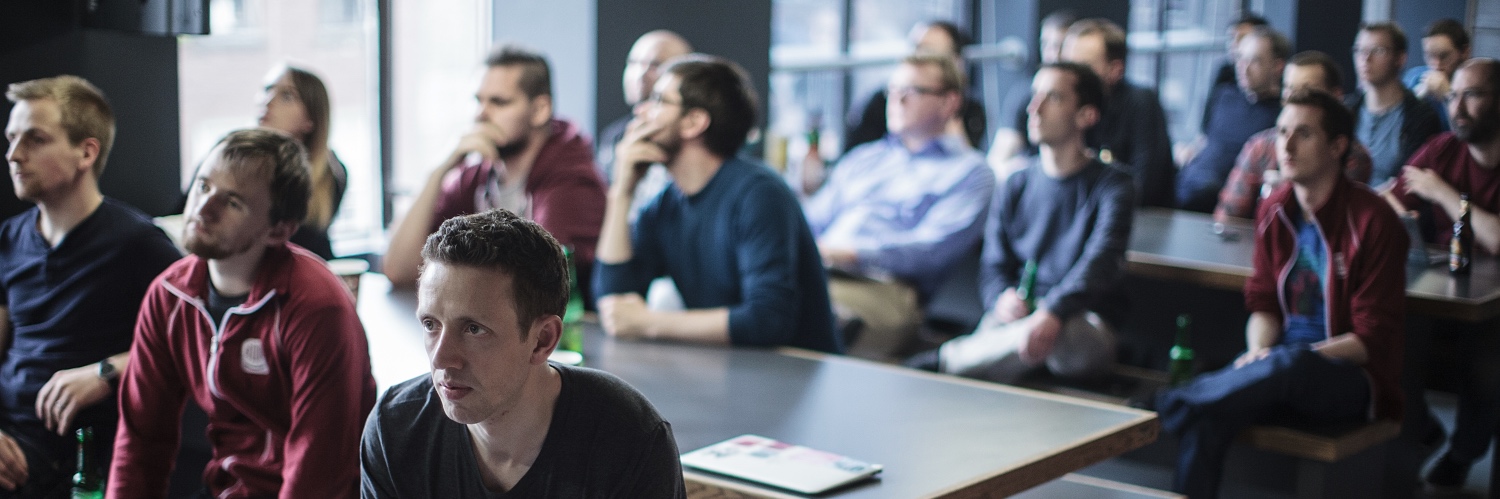 The Intercom team paying close attention at a company-wide presentation.