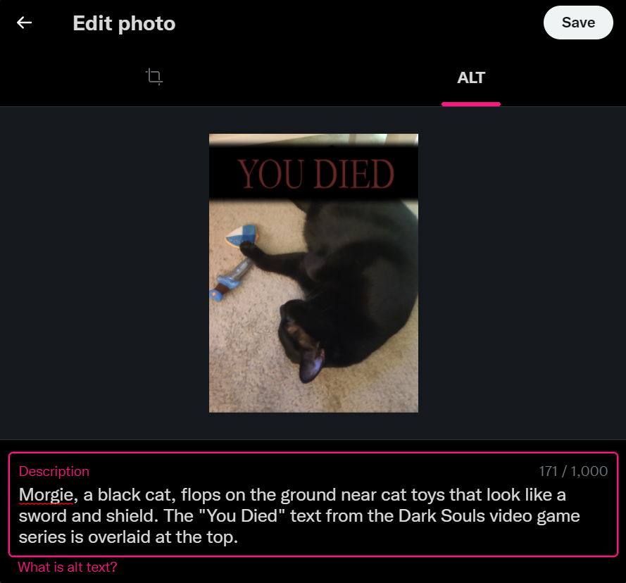 Twitter's "Edit photo" window. It has an image cropping tab on the left and an alt text tab on the right, with the alt text tab highlighted. The window features a Dark Souls meme with a black cat and alt text written in the bottom "Description" box.