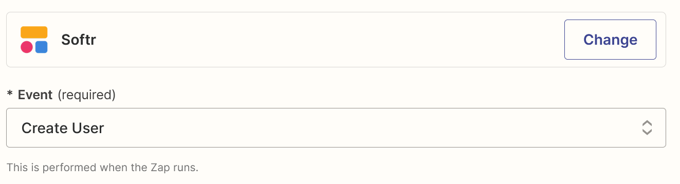 An action step in the Zap editor with Softr selected for the action app and Create User selected for the action event.
