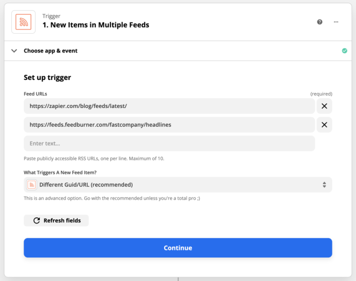Setting up a trigger for new items in multiple feeds. There are spaces to add several feeds to the Zap.