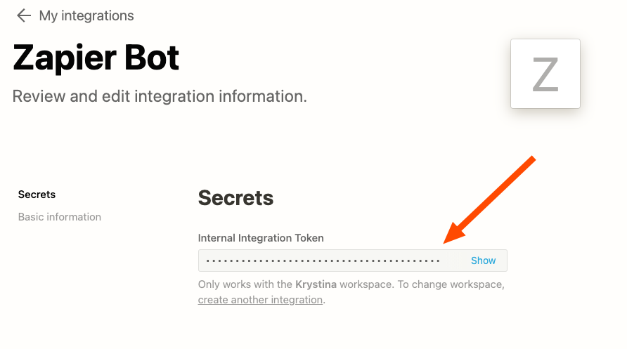 A red arrow highlights the integration token for the new bot.