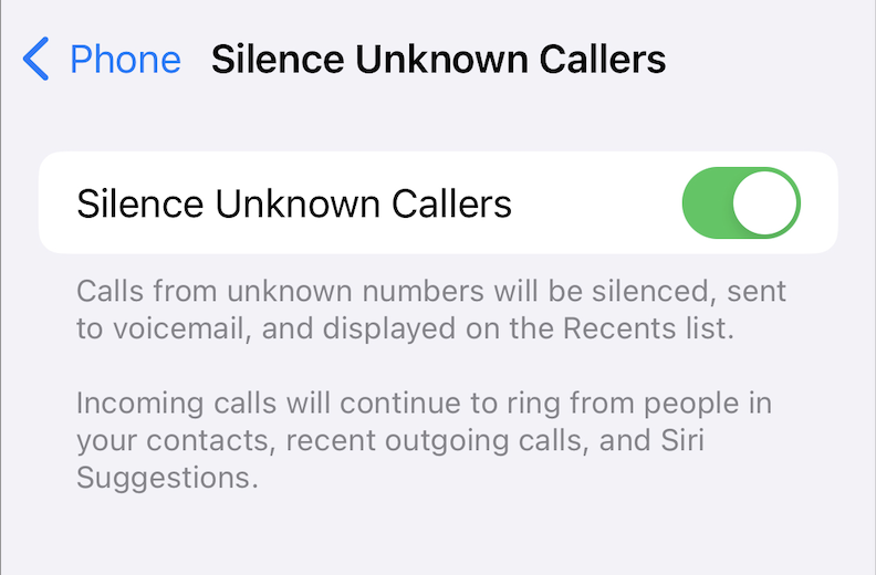 Silence unknown callers feature turned on in the phone settings of an iPhone. 