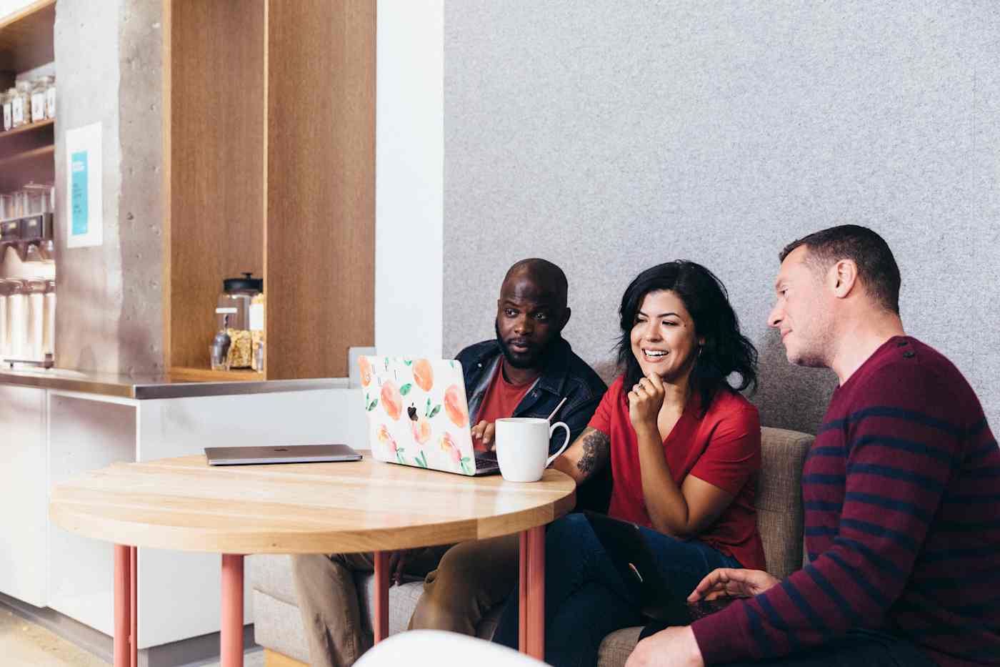 The Asana team working in their office.