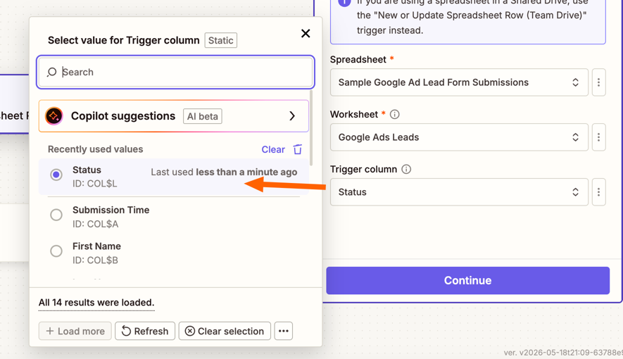 An orange arrow points to the Status toggle for the Trigger column field.