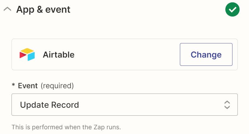An action step in the Zap editor with Airtable selected for the action app and Update Record in the Event field.