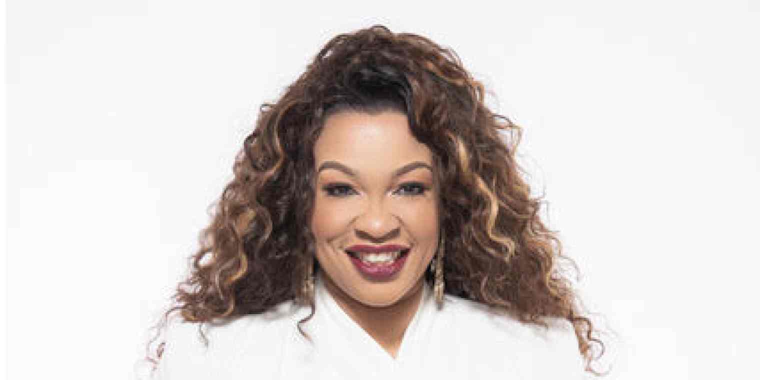 Hero image of L. Michelle Smith looking to camera