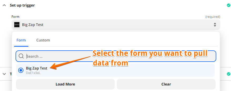 An orange arrow pointing to the name of a form underneath an empty search box. 