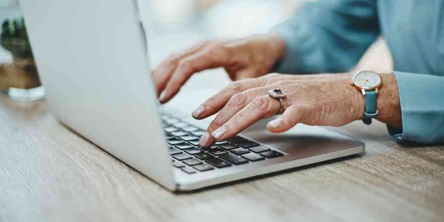 Hero image of someone typing on a keyboard