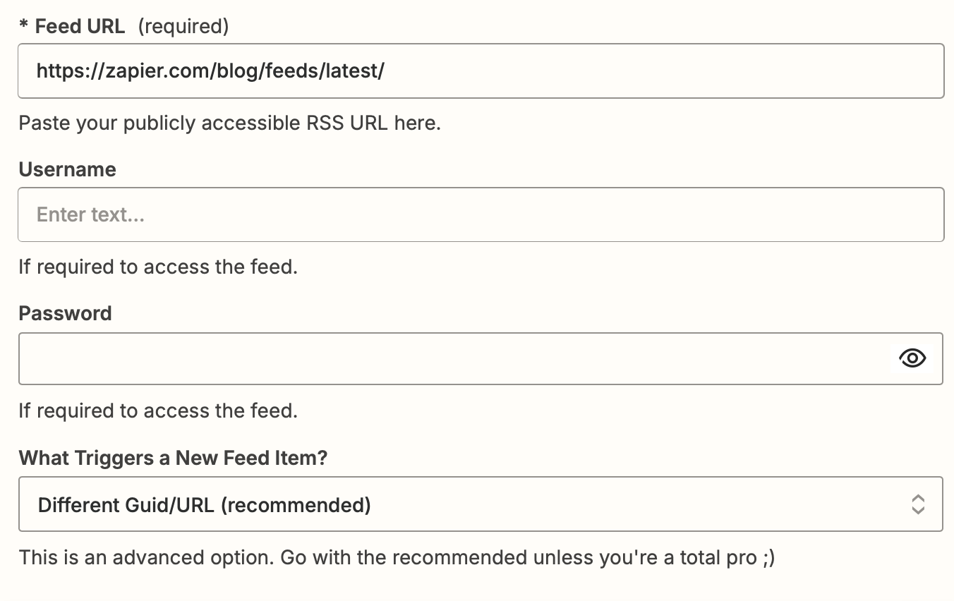 RSS fields in a trigger step in the Zap editor, including Feed URL, username, and password.