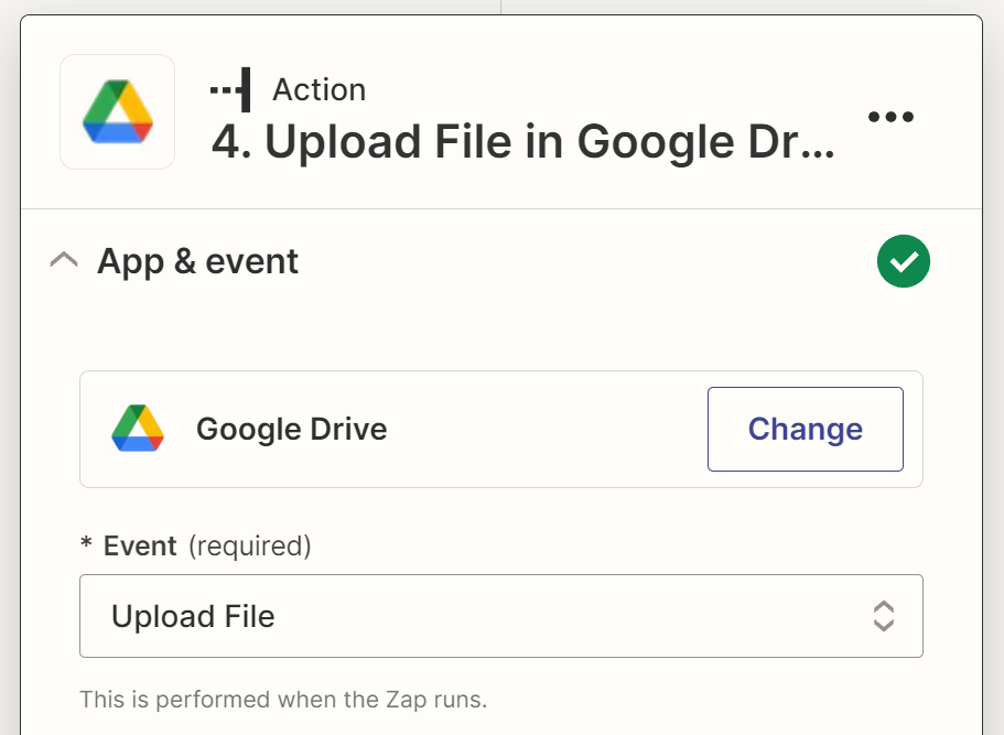 An action step in the Zap editor with Google Drive selected as the action app and Upload File selected for the action event.