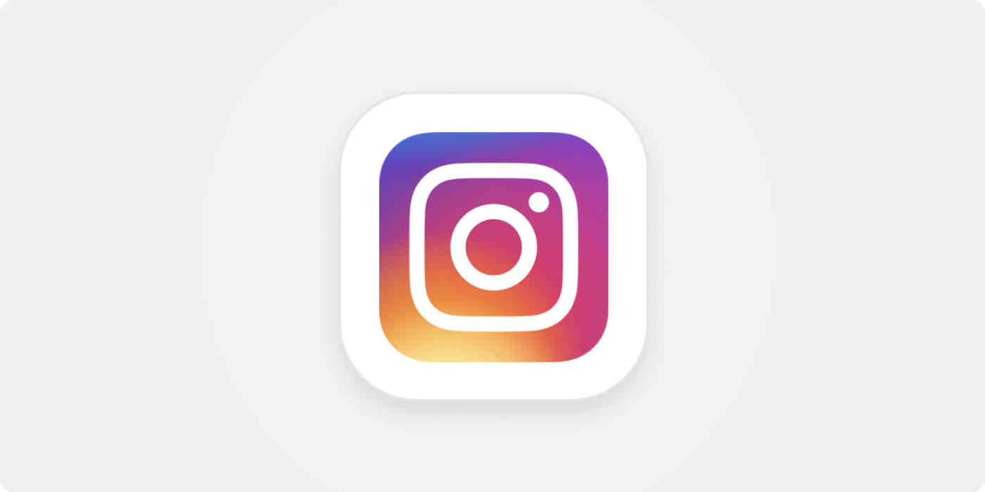 A hero image for Instagram app tips with the Instagram logo on a cream background