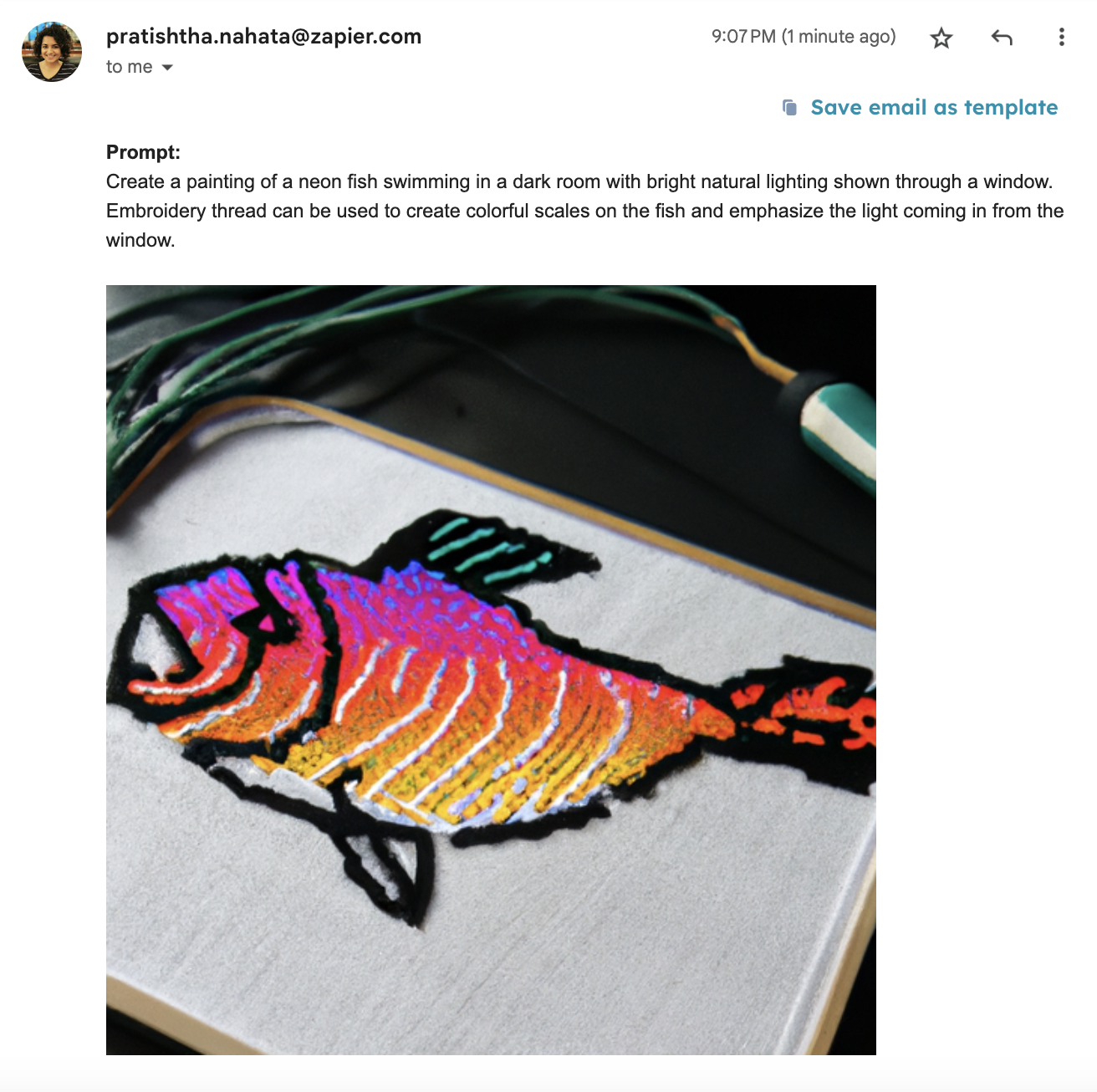 An email with an art inspiration prompt and an image generated by DALL-E of a fish created with embroidery thread.