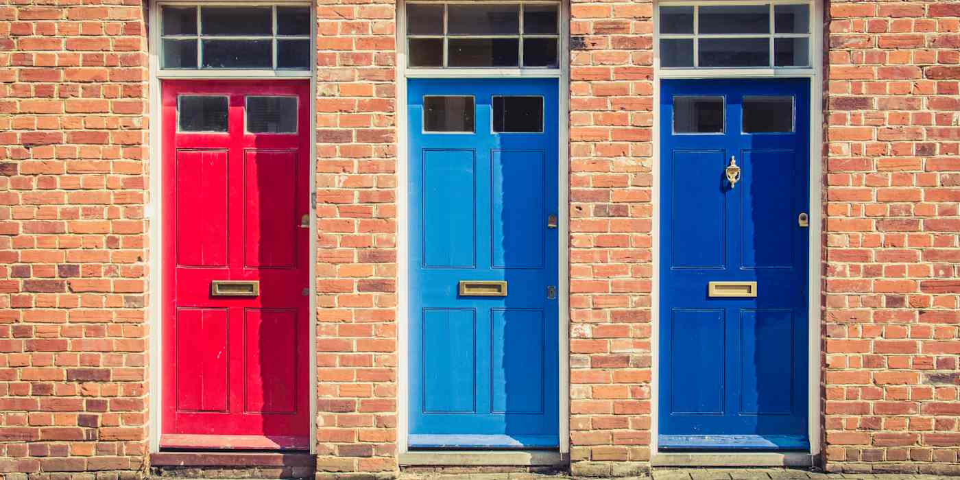 A hero image with a picture of three painted doors