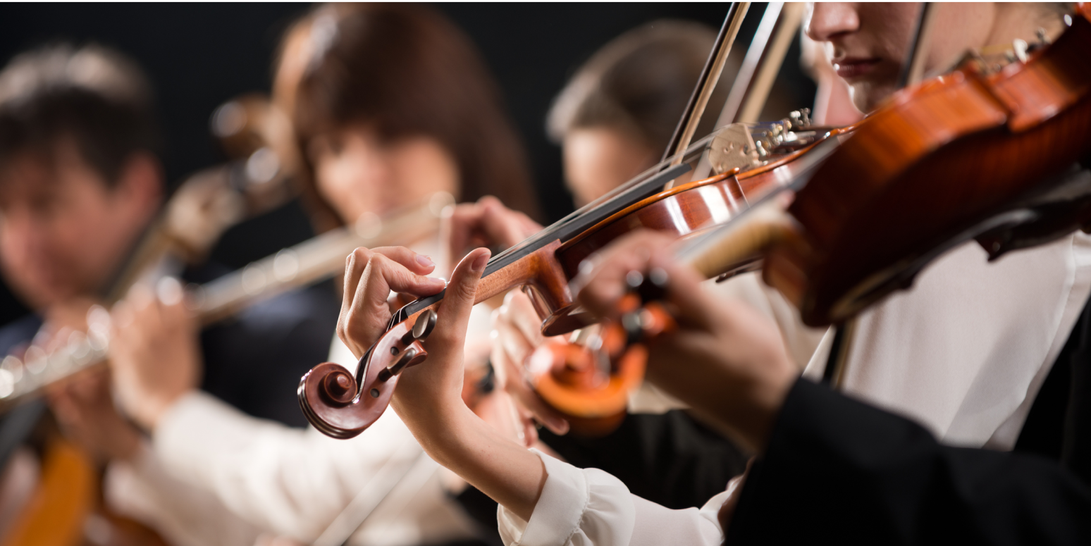 Hero image of people playing the violin