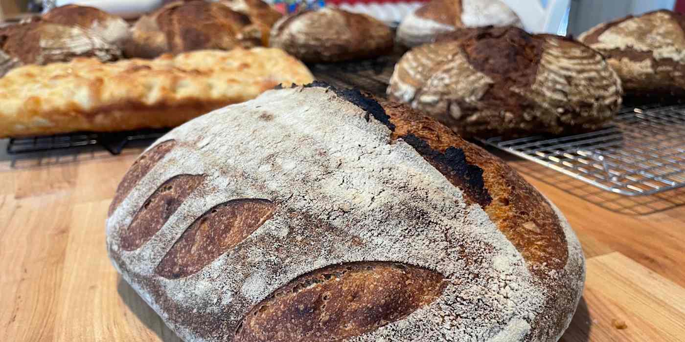 Hero image with breads from a home bakery