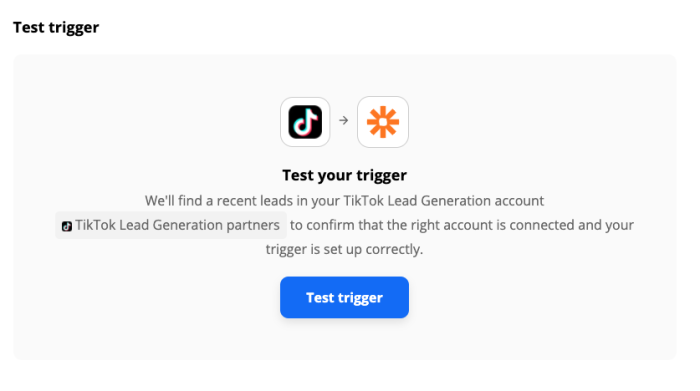 A Zapier screenshot showing the TikTok and Zapier logos with text explaining that this test will find recent leads in your account. A blue button reading "test trigger" is toward the bottom.