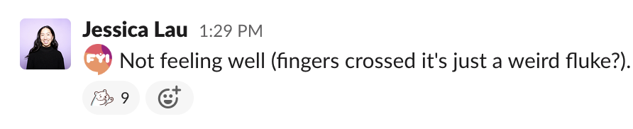 Slack message with a hug custom Slack emoji reaction.