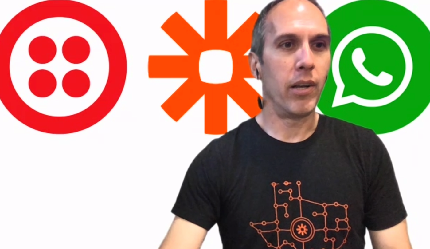 Ben in front of the Twilio, Zapier, and WhatsApp logos