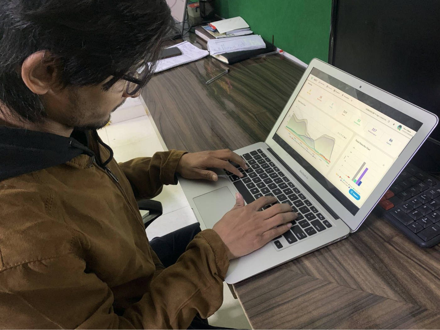 One of our team members analyzing bot's performance