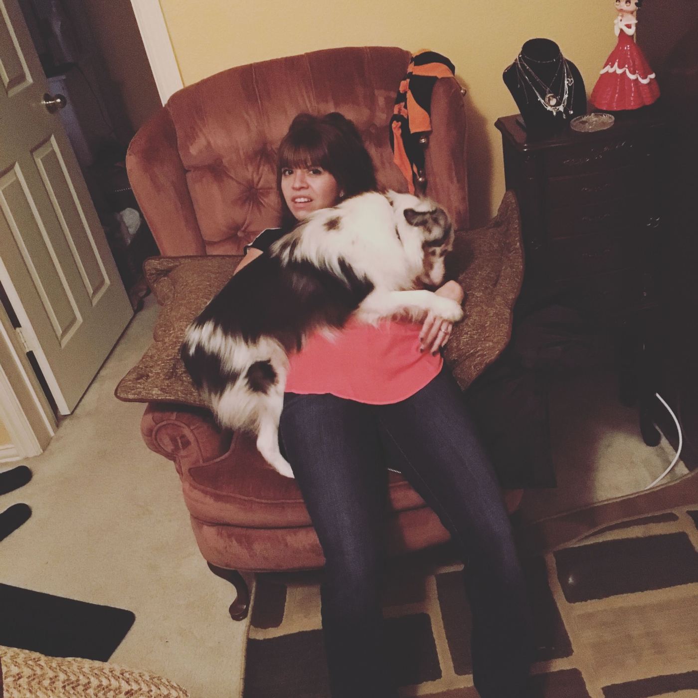 Krystina snuggling with a very beautiful dog