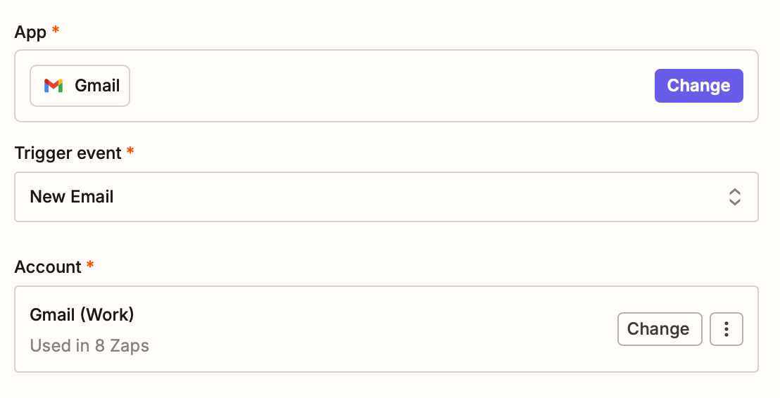 A window inside the Zap editor with options to select an app, trigger event, and account