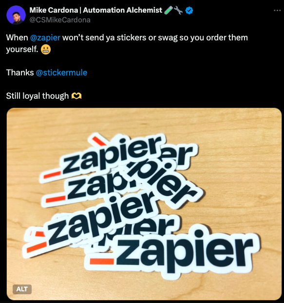 A social post where a Zapier customer shows the Zapier stickers they custom printed