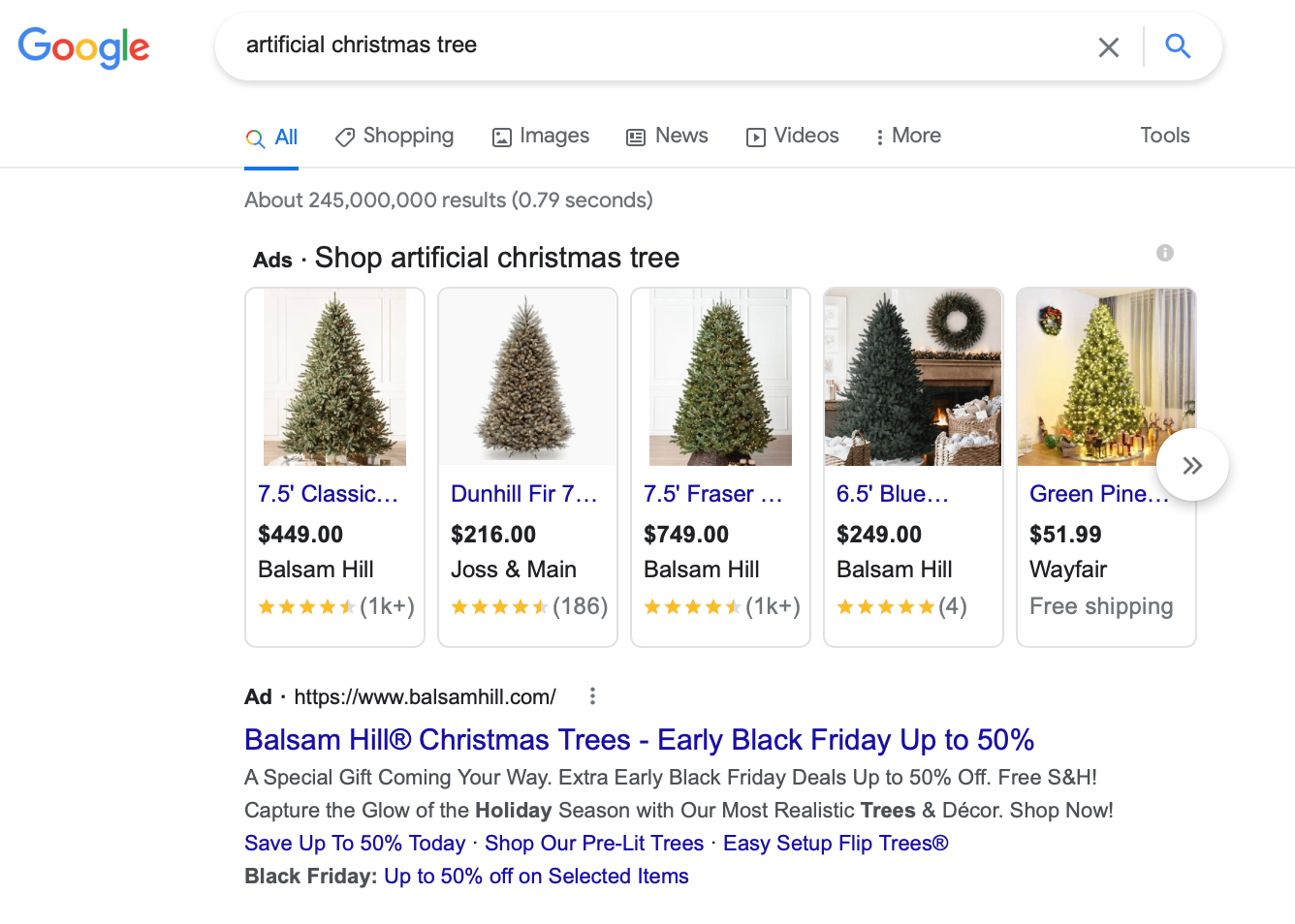 A search for "artificial Christmas tree" that shows shopping ads and a search ad for Balsam Hill