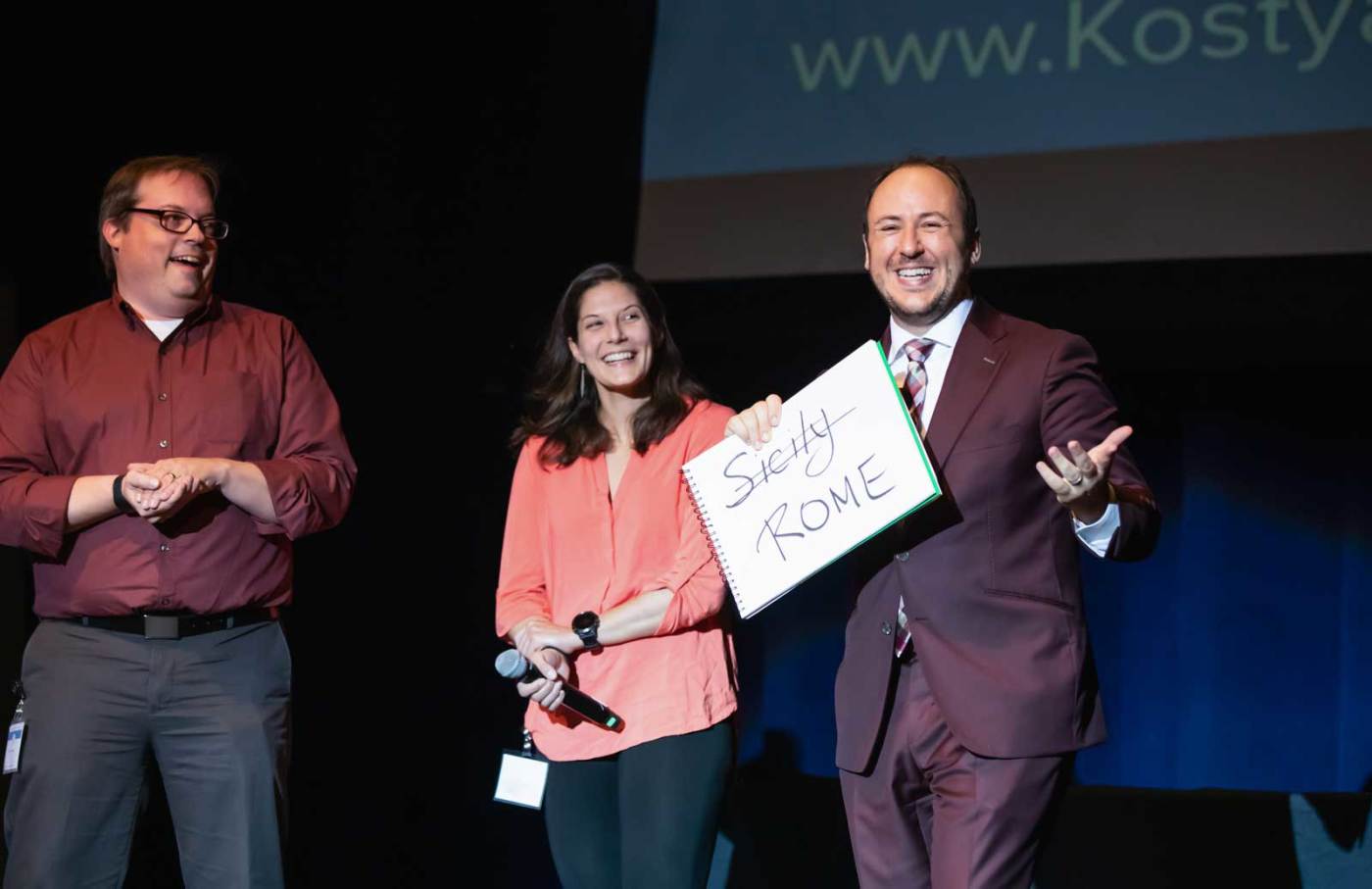 Kostya speaking at an event