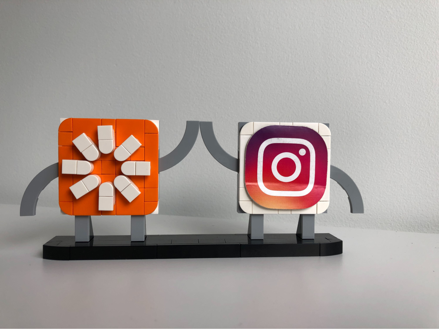 Instagram and Zapier logo LEGOs