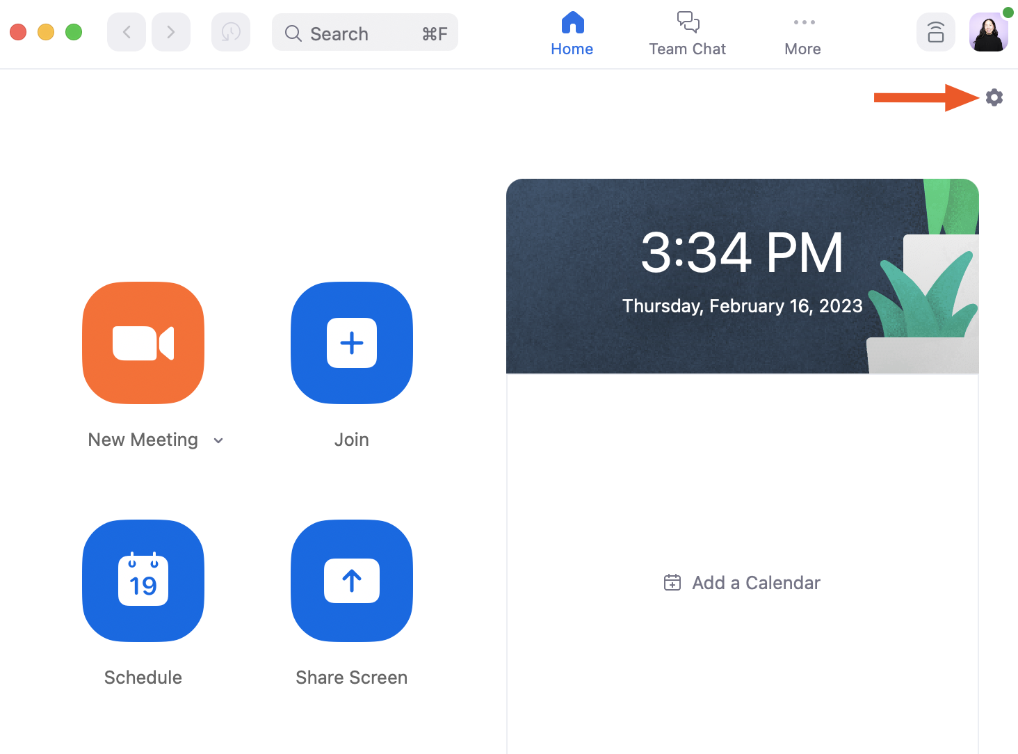 Zoom Desktop Client with an arrow pointing to the settings cog icon.