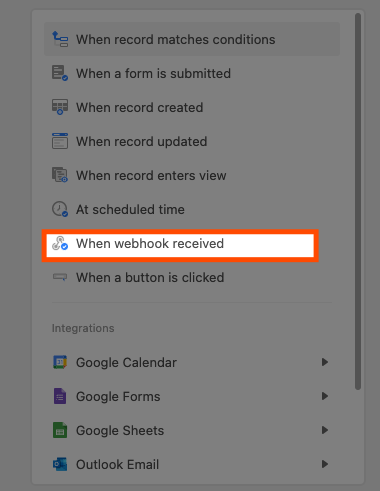 An orange box highlights the "When webhook received" option.